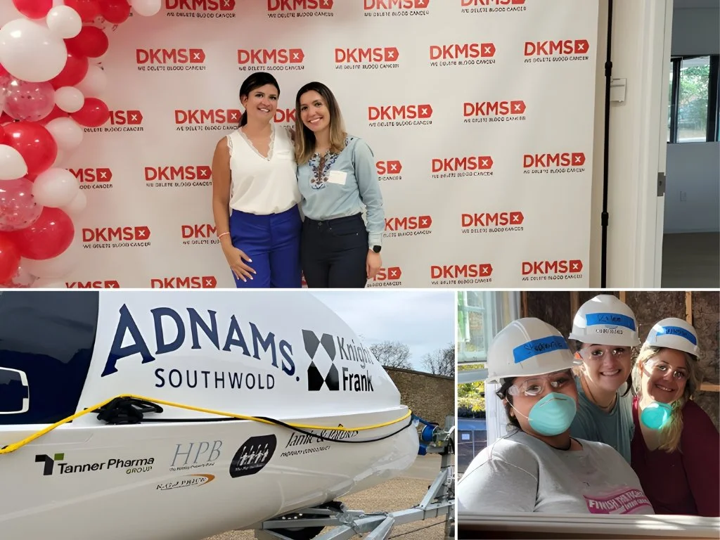 Group of women in safety gear standing and smiling inside a room, with balloons and a branded backdrop, and a boat with sponsor logos in the foreground.