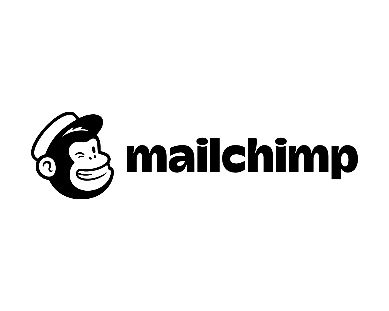 Black and white Mailchimp logo featuring a smiling cartoon monkey with a sailor hat and the word 'mailchimp' in bold lowercase letters