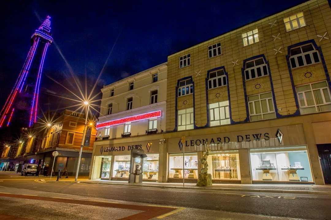A photograph showcasing external signage for Leondard Dews in Blackpool.