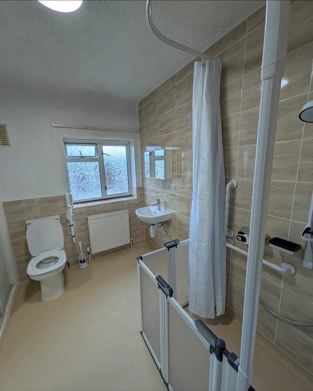 Disabled Adaptation. 

Here we have a recent disabled adaptation carried out from tiling to flooring we took care of everything. 

Swipe right to see the before pics. Massive transformation!!

We complete all types of works including 
- Tiling 
- Ele