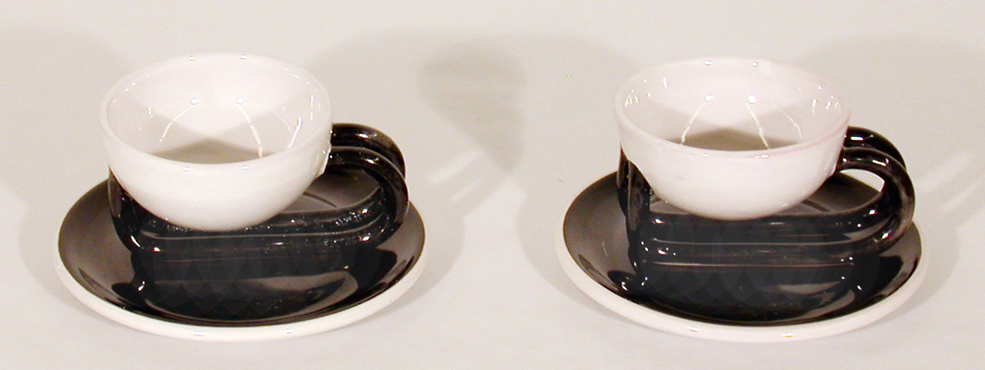 Unknown Artist; Two Cups with Saucers, Italian Futurists, after Mazzotti's 1930 design, 2002; 2007.004.11; 2" x 5" each; Whiteware; Gift of Garth Clark and Mark Del Vecchio