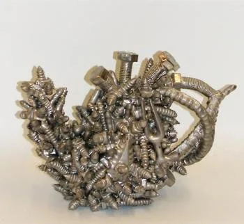 Susan Beiner; Beans, Bolts, and Screws Teapot, 2000; 2000.1 A-B; 8.5" h x 10"w x 6"d; Purchased through funds provided by the SAMFA Collector's Society