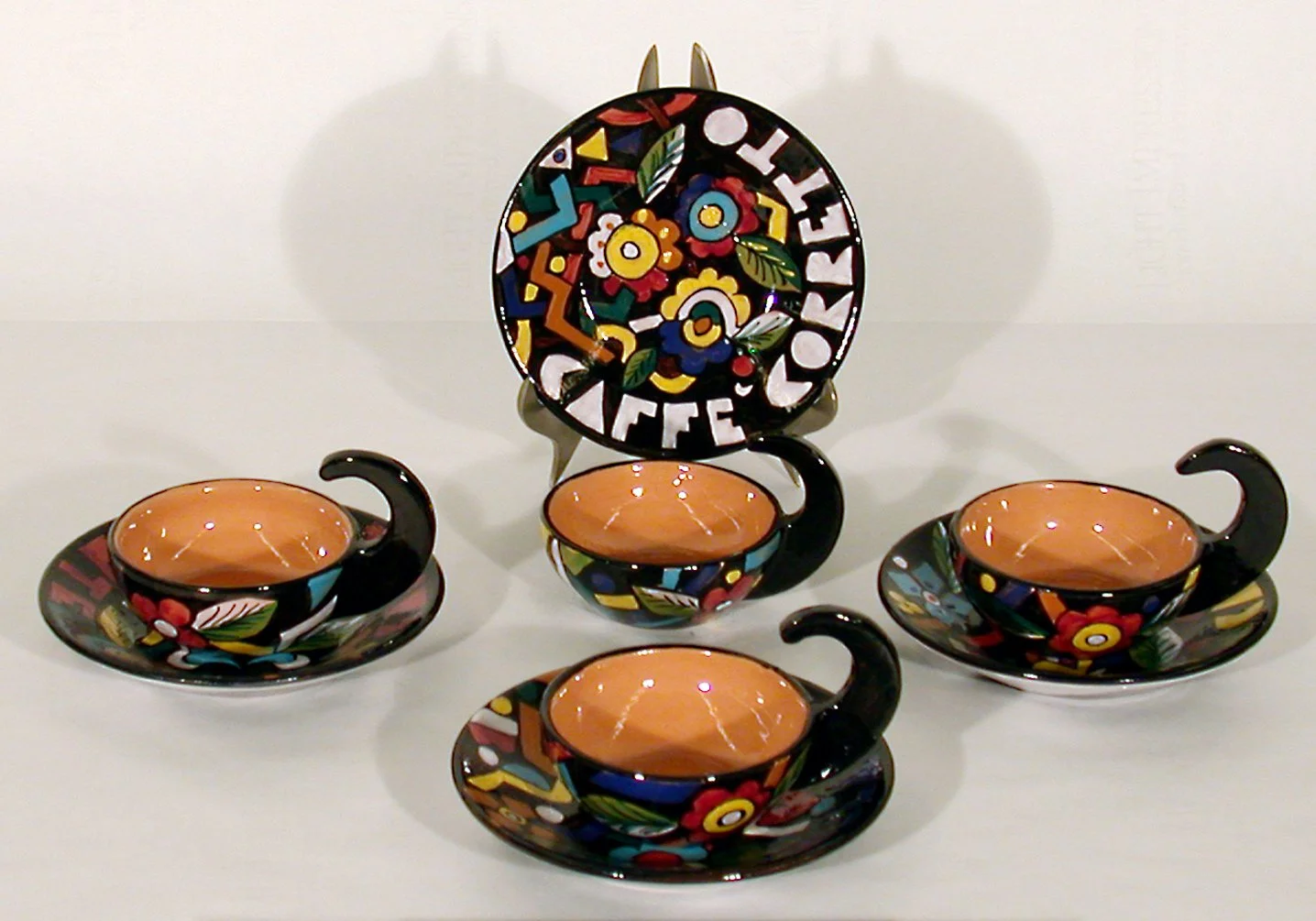 Unknown Artist; Four Cups with Saucers, Italian Futurists, after Mazzotti's 1930 design, 2002; 2007.004.10; 2" x 5" each; Whiteware; Gift of Garth Clark and Mark Del Vecchio