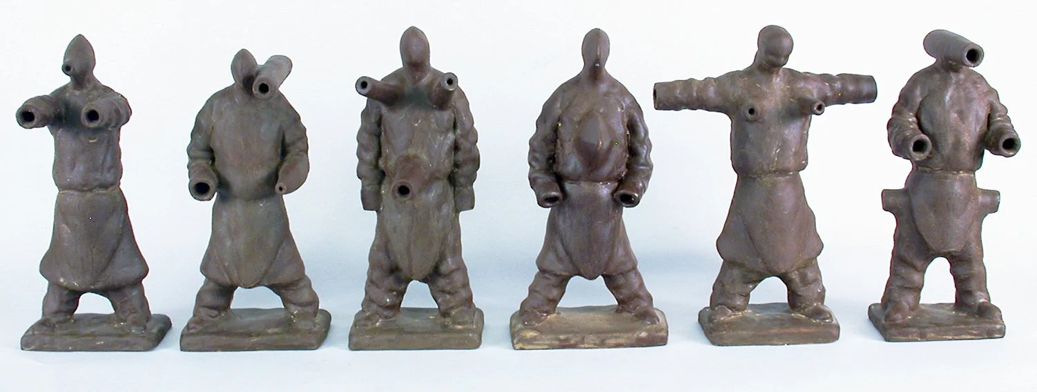 Kin Kwok; Men with Guns, 2003-2006; 2006.008.00; 12” x 72” x 3"; Ceramic; Museum purchase with funds from the SAMFA Collectors Society