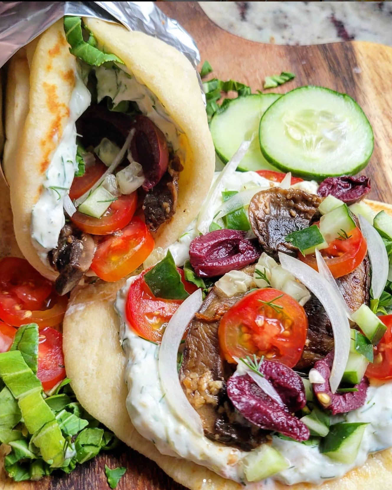 On these hot, humid, Florida days sometimes you just need something cool and refreshing! Garlic Mushroom Gyros with homemade Vegan Tzatziki Sauce!