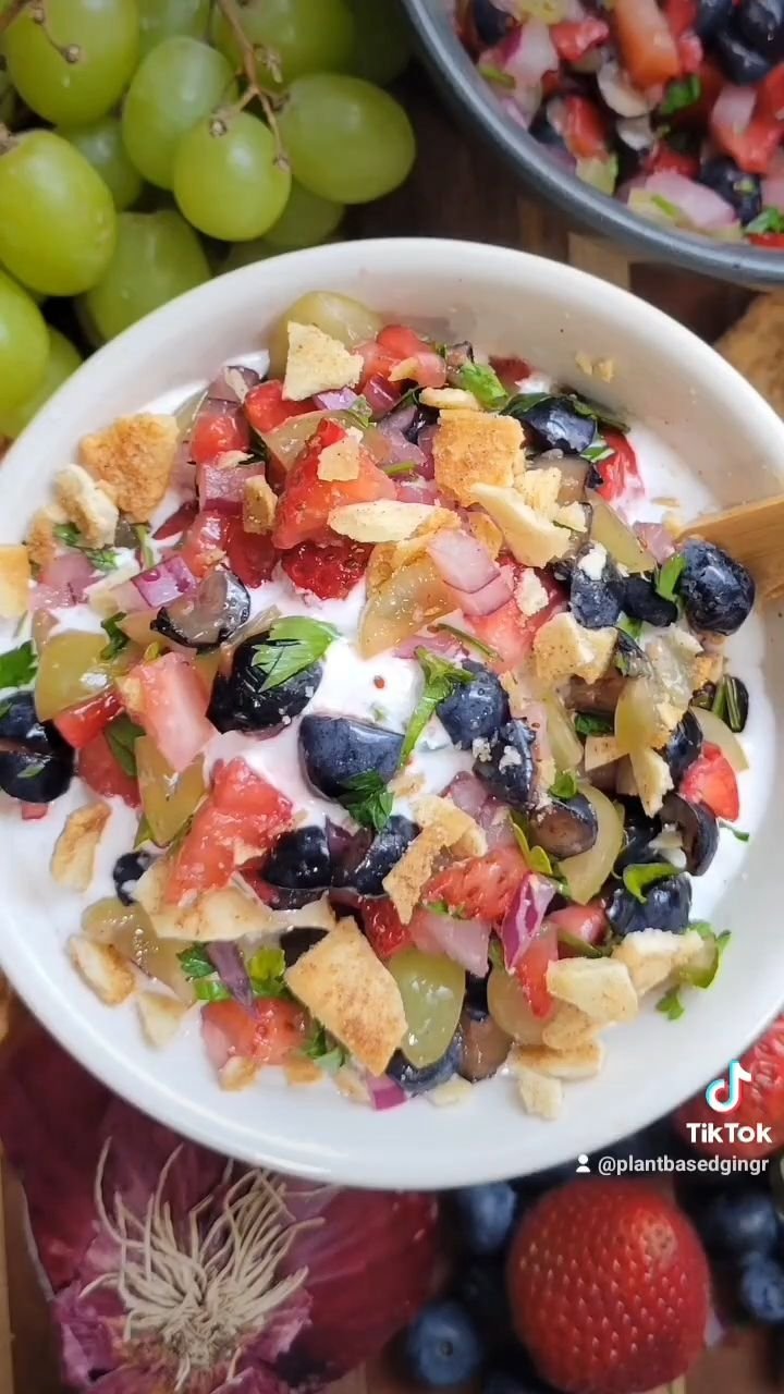 Beat the heat with this Fresh Summer Fruit Salsa loaded with blueberries, strawberries, grapes, black berries, red onion, and fresh herbs!
Dont let the onion and herbs scare you off! They are the perfect balance to the sweetness of all the fruit.