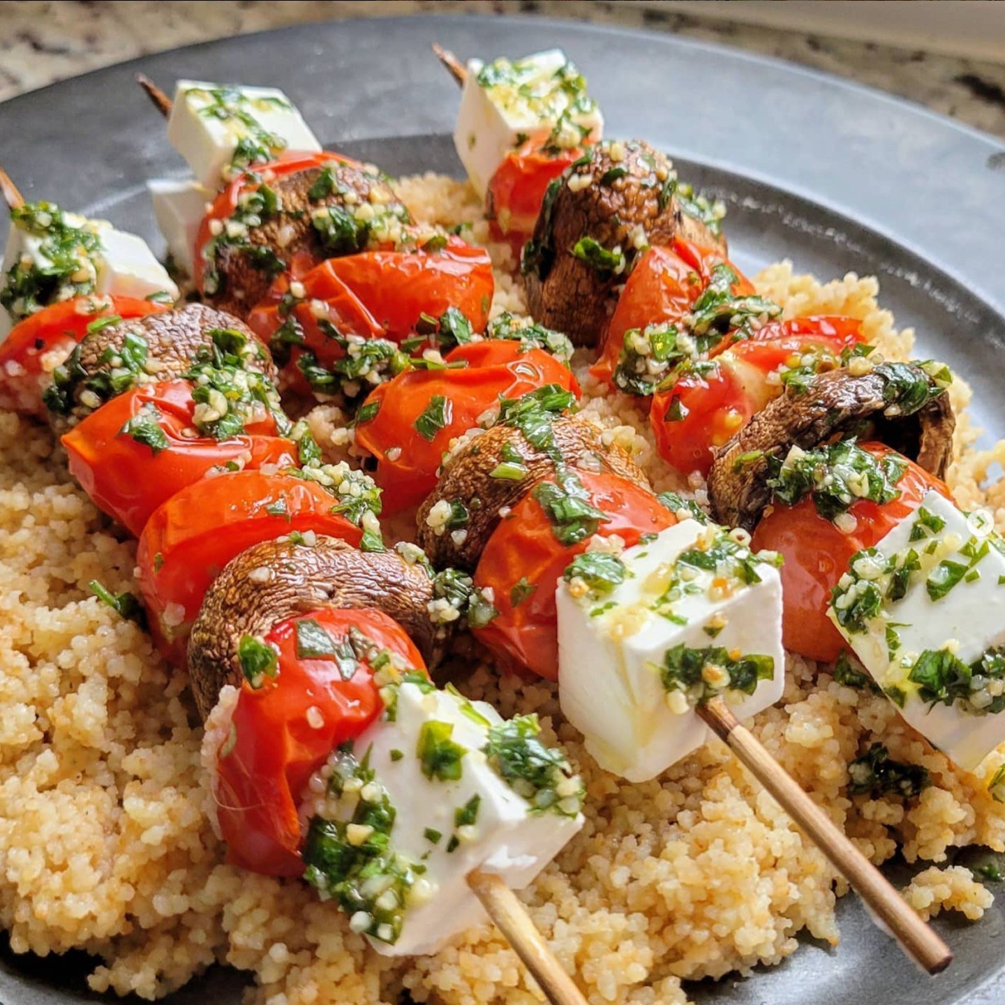 Need a dish that cooks up quick, tastes amazing, and looks super impressive on the plate? These mediterranean inspired kabobs with fresh pesto, served over fluffy couscous are it! And, no...you dont need a grill to make a great kabob!
These cooked u