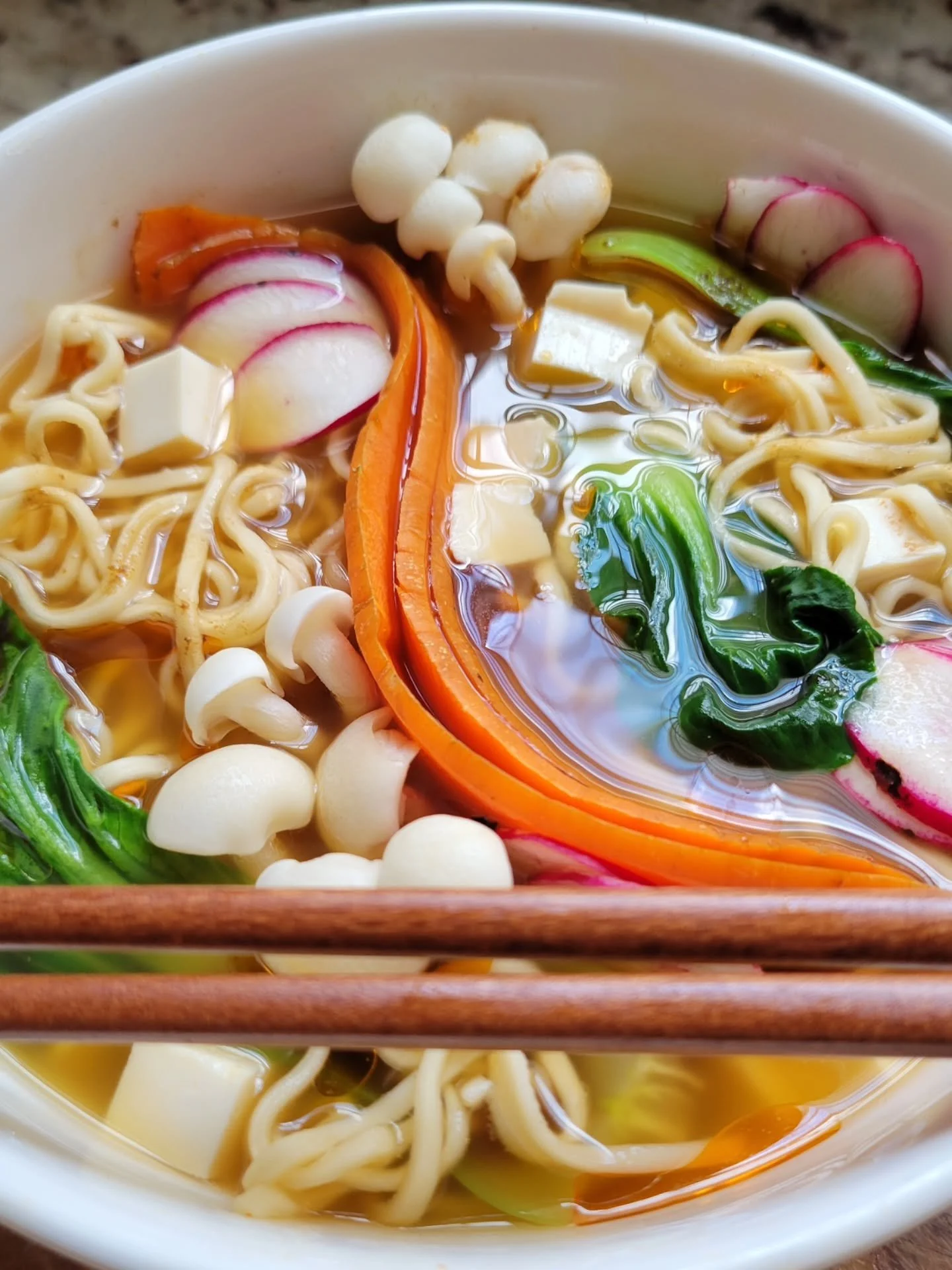 Once you make your own #ramen bowls...it's a total #gamechanger. This one includes veggie broth, carrot, baby bok choy, raddish, mushrooms, and tofu with some sesame and chili oil. Is it "authentic ramen?" Eh, honestly, I have no idea. Is