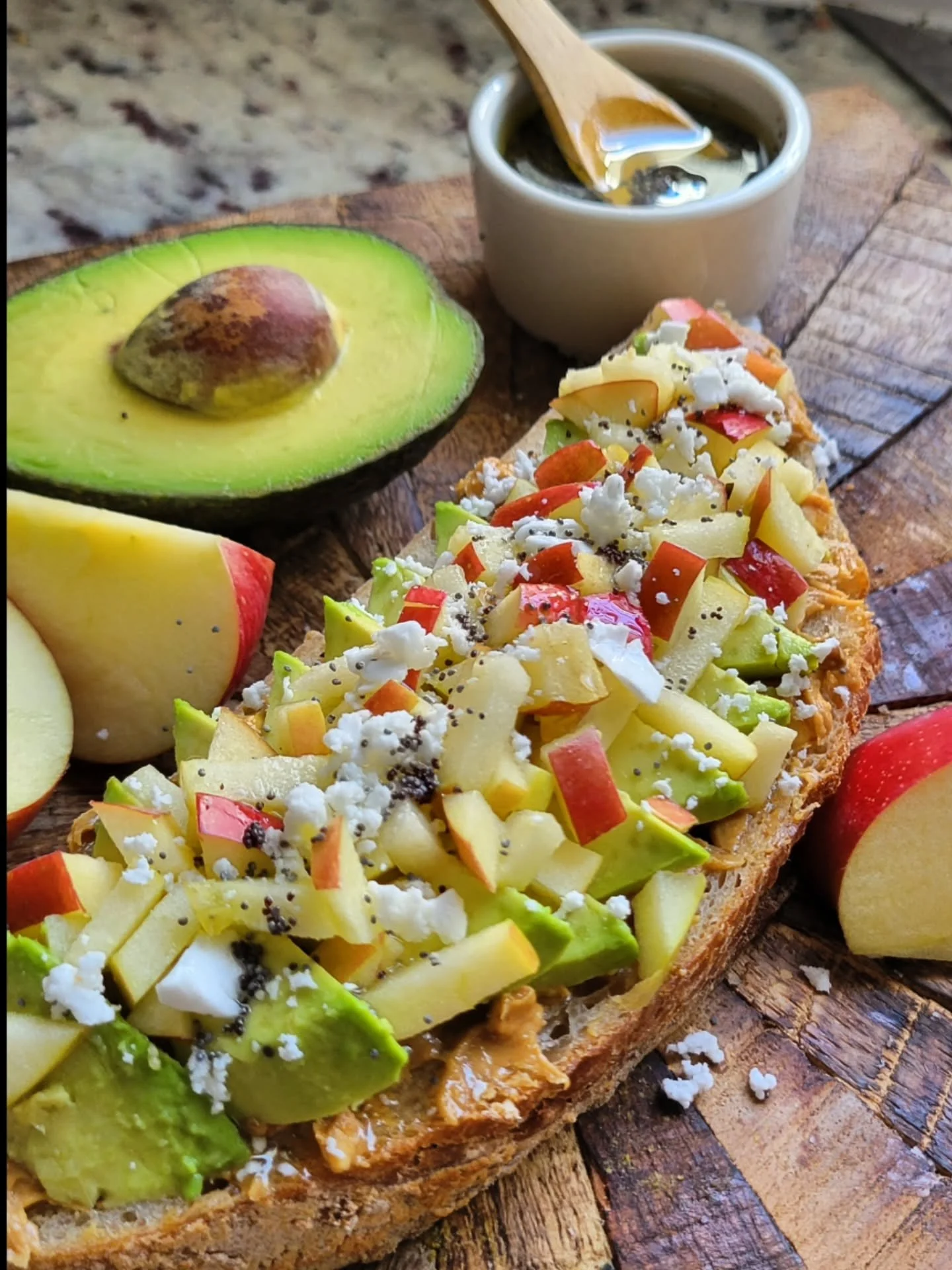 Need a little extra energy for your manic Monday? Try topping your avocado toast with peanut butter, apples, and a little poppyseed dressing!
