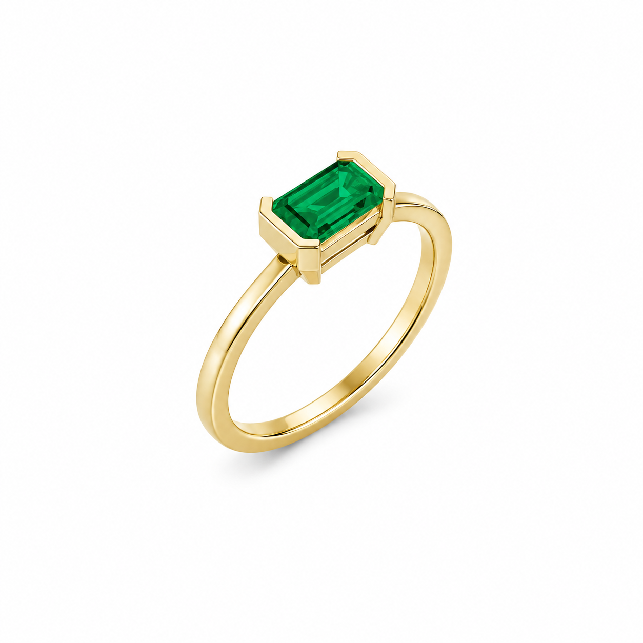Emerald East-West Open Bezel Ring