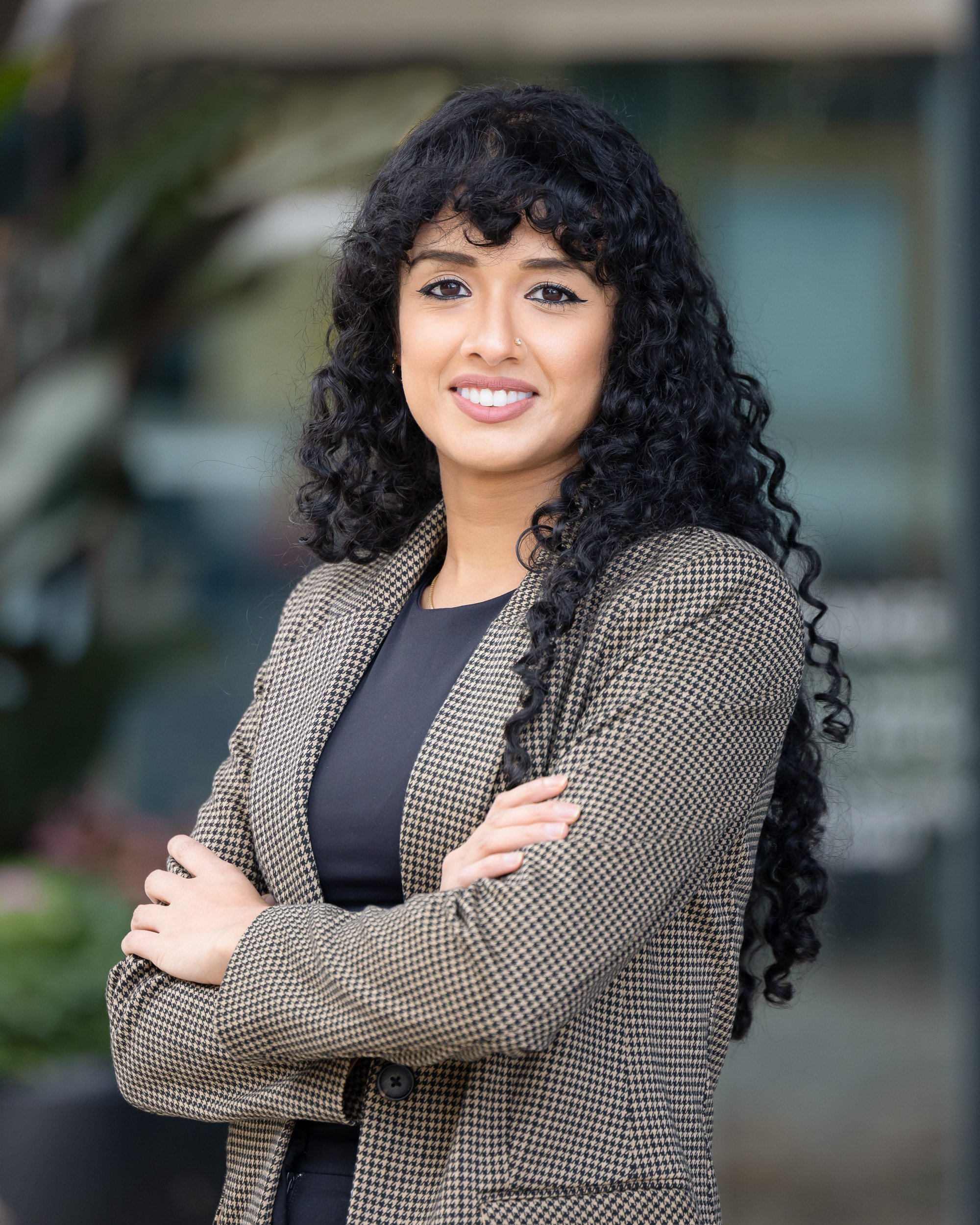 headshot of woman in natural outdoor setting