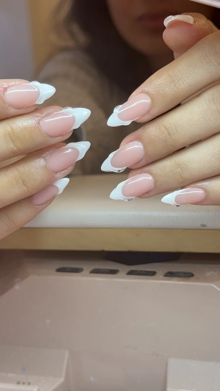 Alexis nail art at Serene Nail Club NYC: Classic white French tips