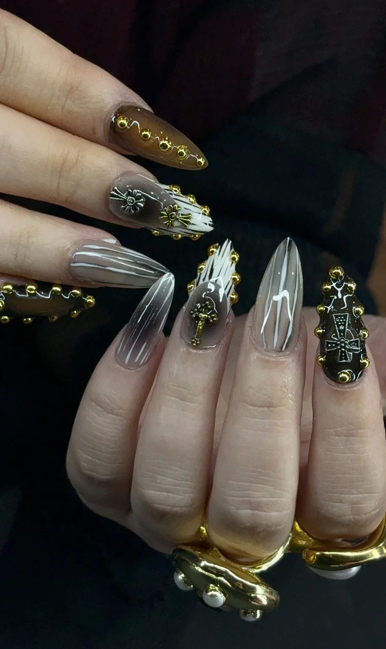 Reina nail art at Serene Nail Club NYC: White and beige stripes with florals, bows and gold