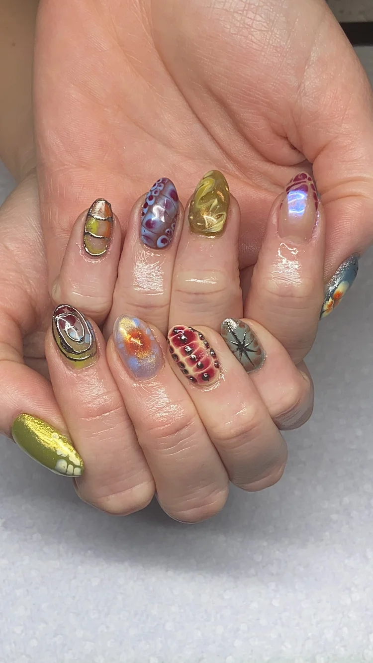Alexis nail art at Serene Nail Club NYC: Colorful, intricate artistic designs on each nail