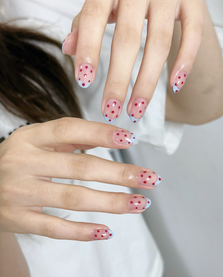 Iris nail art at Serene Nail Club NYC: Pink and blue polka dots