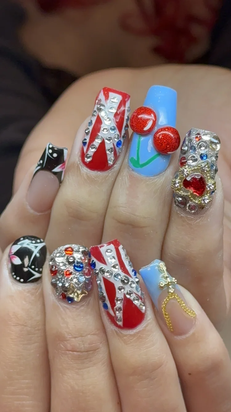 Alexis nail art at Serene Nail Club NYC: Rhinestones, painted patterns and 3D embellishments