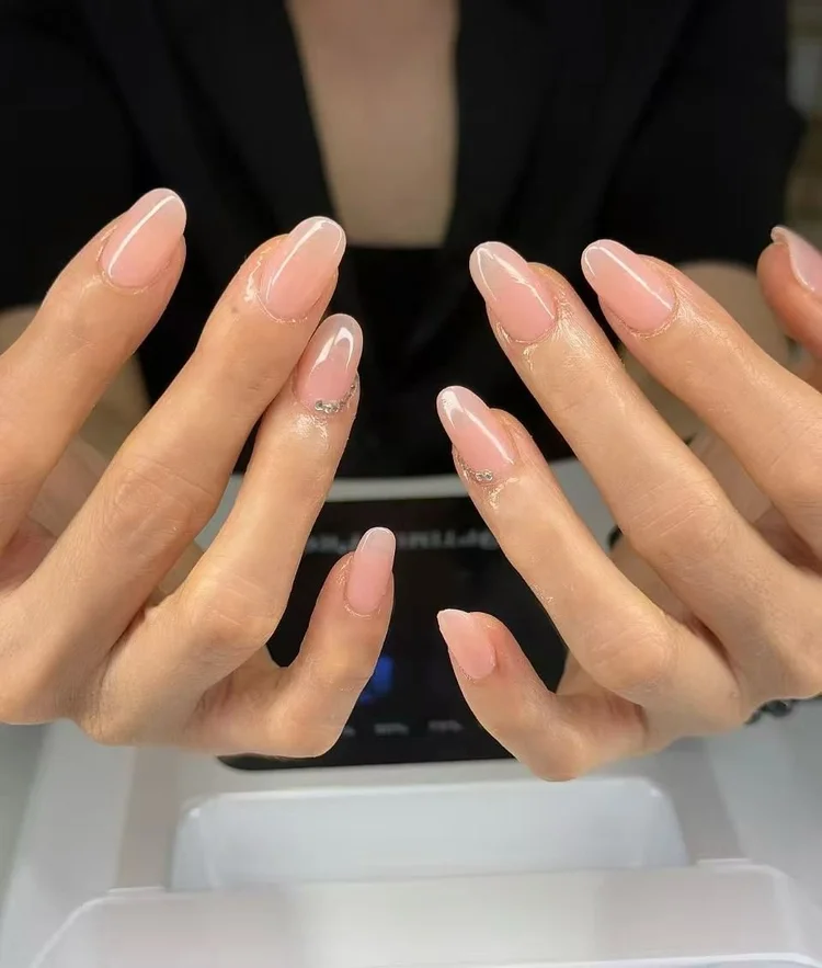 Iris nail art at Serene Nail Club NYC: Nude nails with subtle nail art