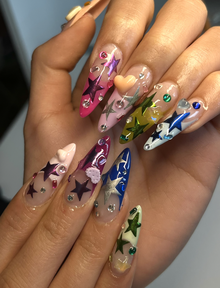 Natalie nail art at Serene Nail Club NYC: Colorful stars and hearts with rhinestones