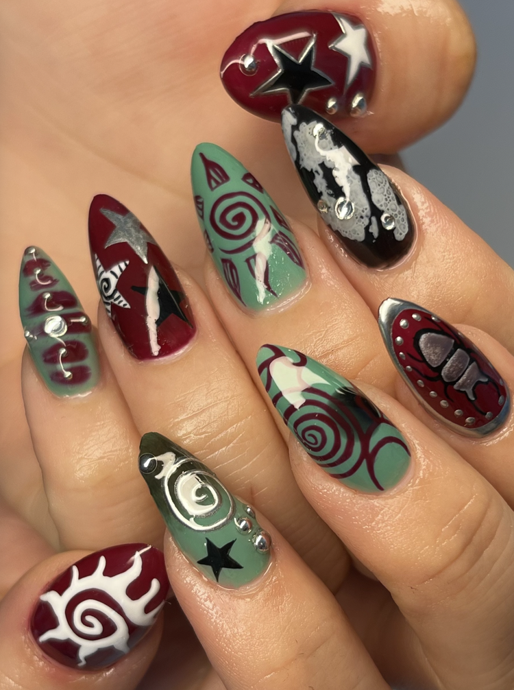 Natalie nail art at Serene Nail Club NYC: Halloween stars and spirals in black, red, green and silver