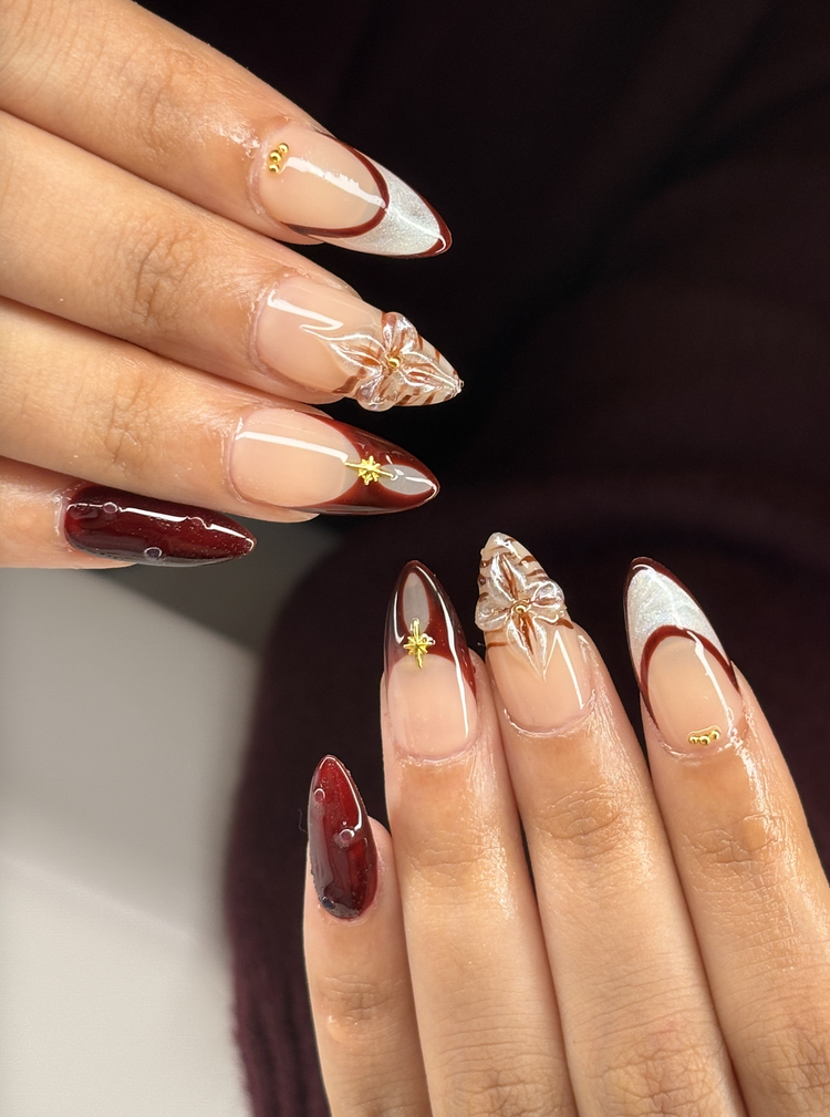 Reina nail art: Red, white and gold with florals, leaves and gold stars