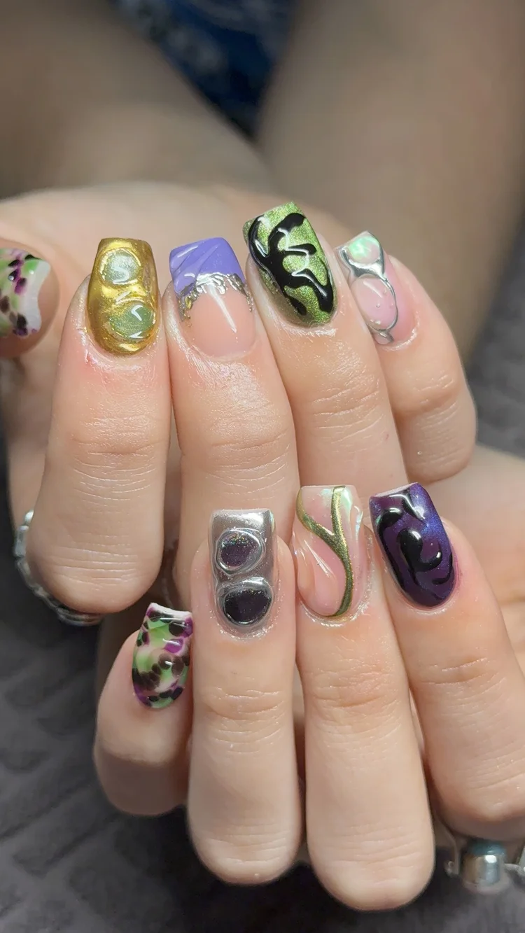 Alexis nail art at Serene Nail Club NYC: Colorful artistic designs with mixed patterns and effects