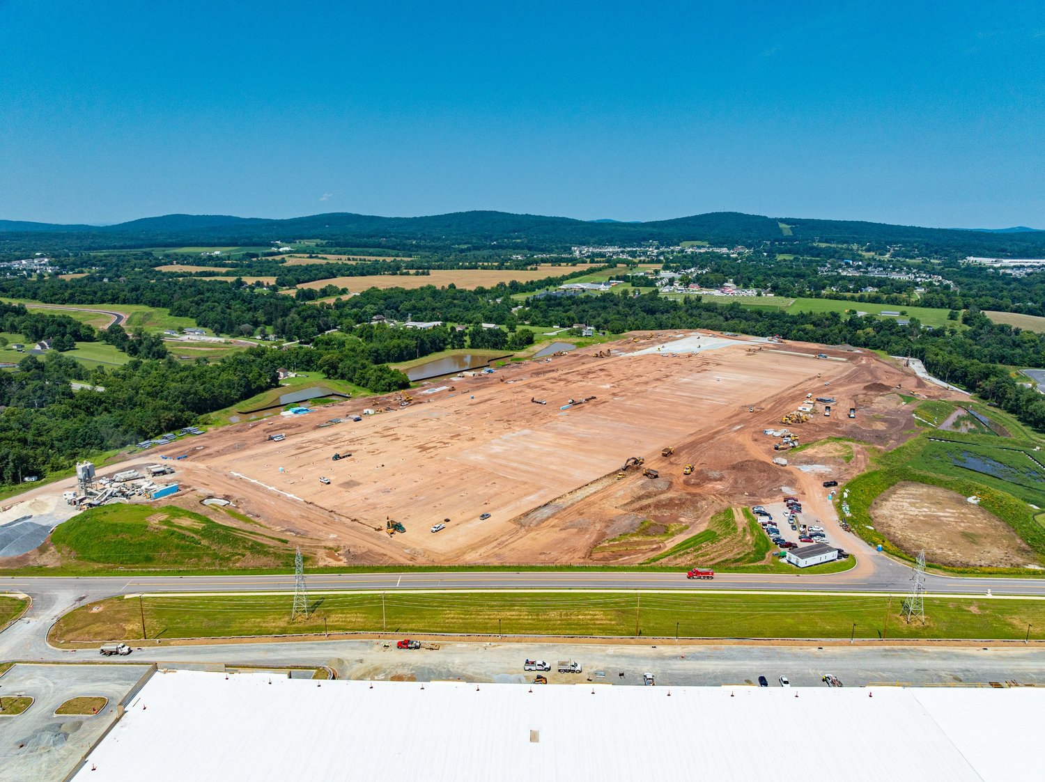 Wide aerial view of an active construction site