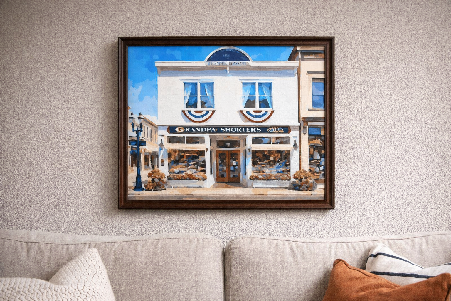 Grandpa Shorter’s Summertime Storefront features the historic Grandpa Shorter’s Gifts building on Mitchell Street in downtown Petoskey, Michigan, shown in full summer bloom with vibrant flowers and warm sunlight, capturing the lively charm of this be