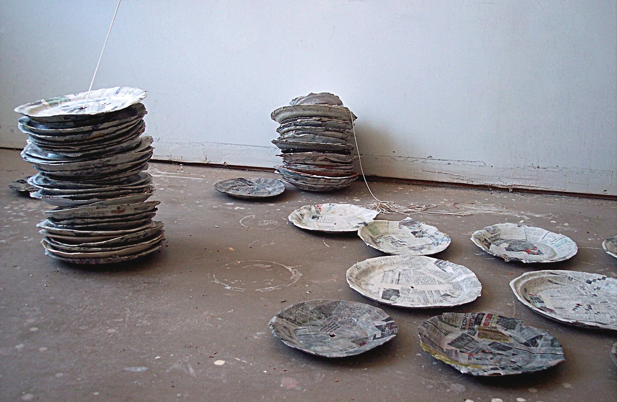 Excess & Restraint, variable, earthenware newspaper, paint, string 2008