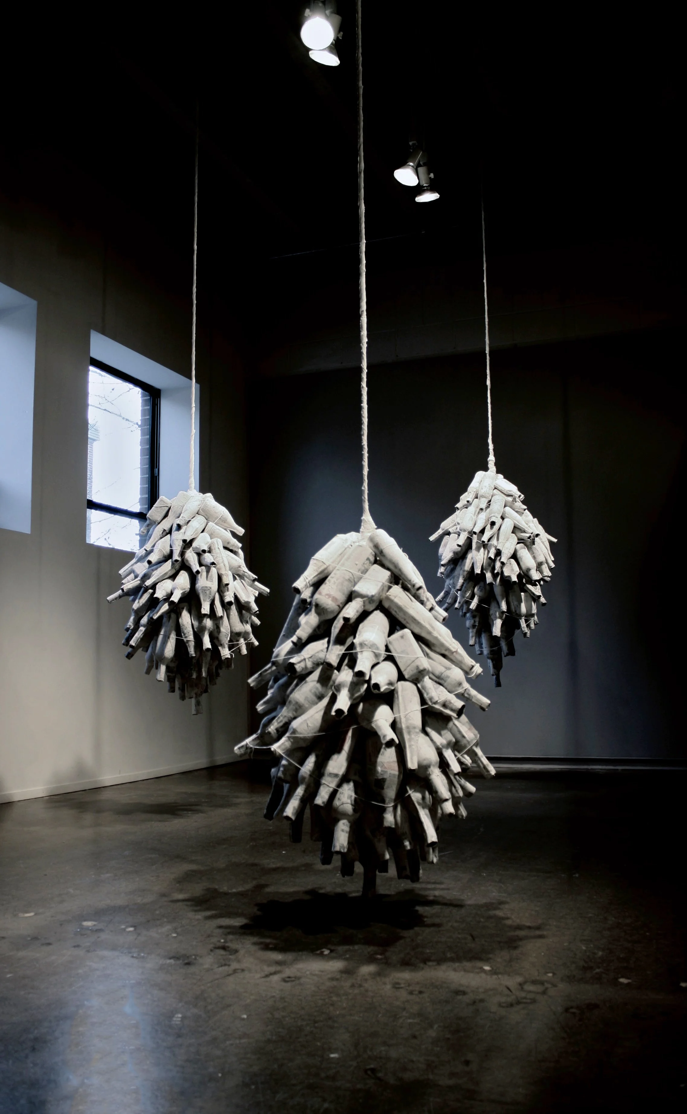 Apart, 11’ x 13, earthenware, newspaper, paint, paper mache, string , 2008