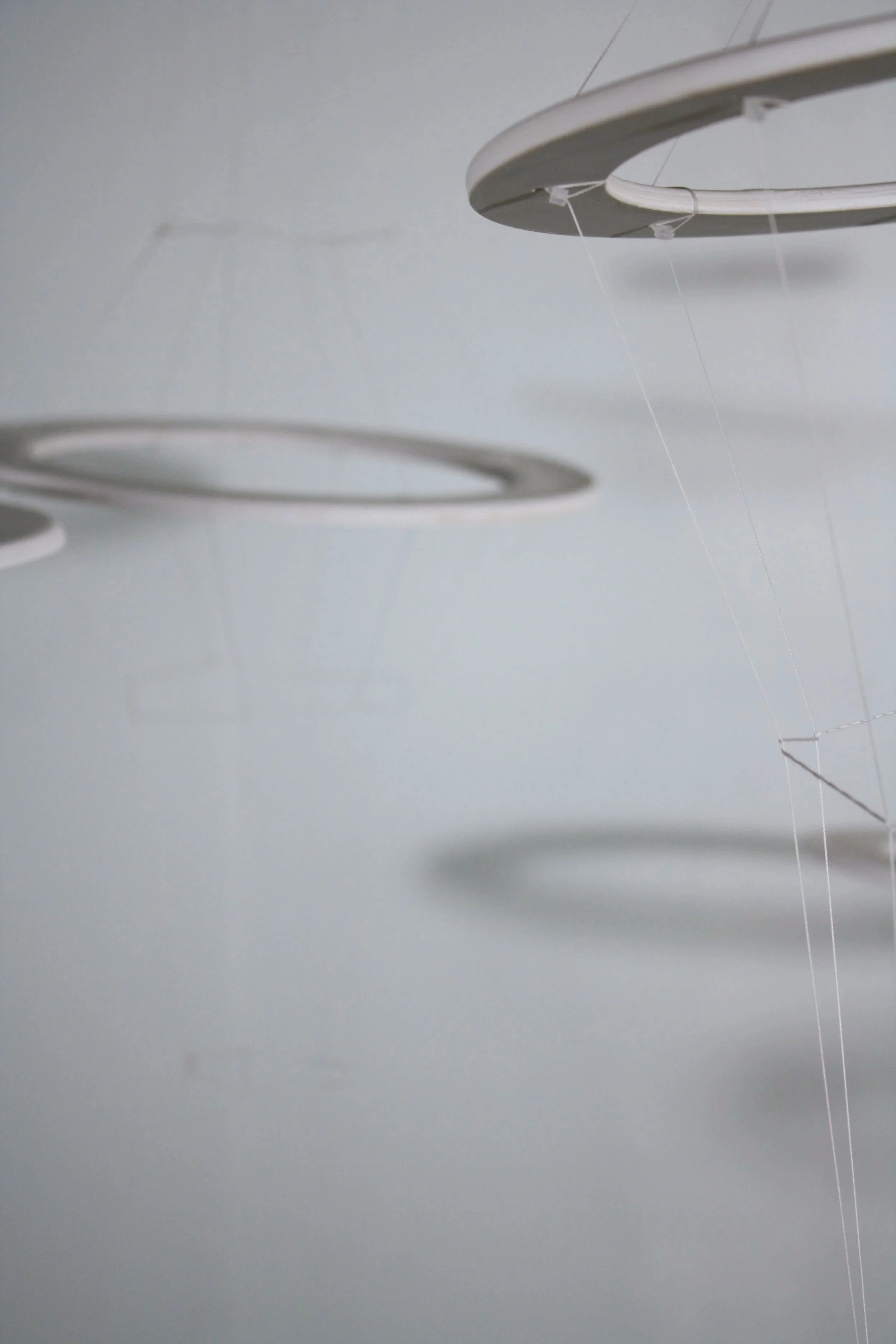  Halos , detail, 48" x 10", Low- Fire Paper Clay, 2026	