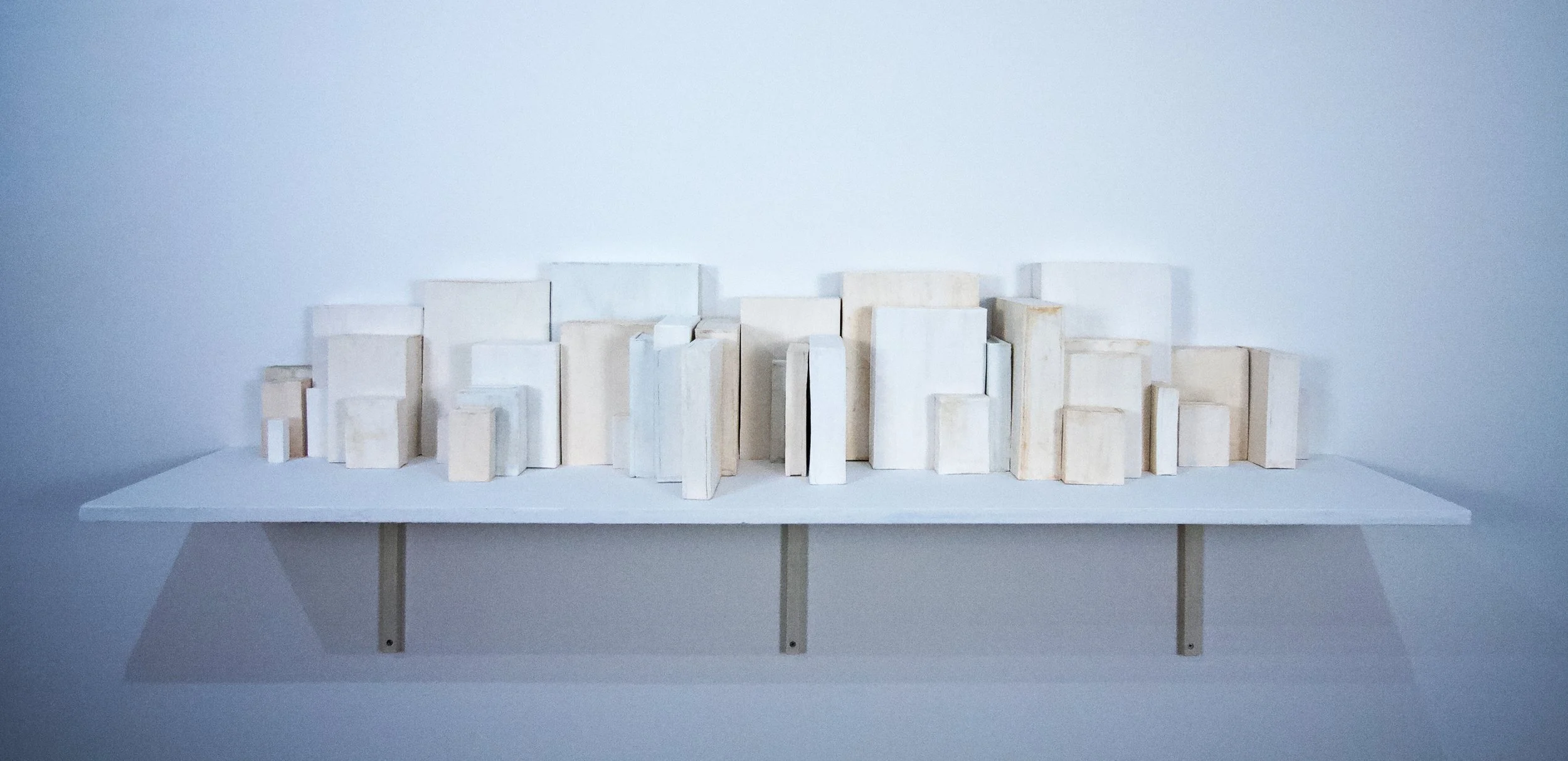  White Boxes , 11" x 27 x 16", Low-fire Paper Clay, 2025																					