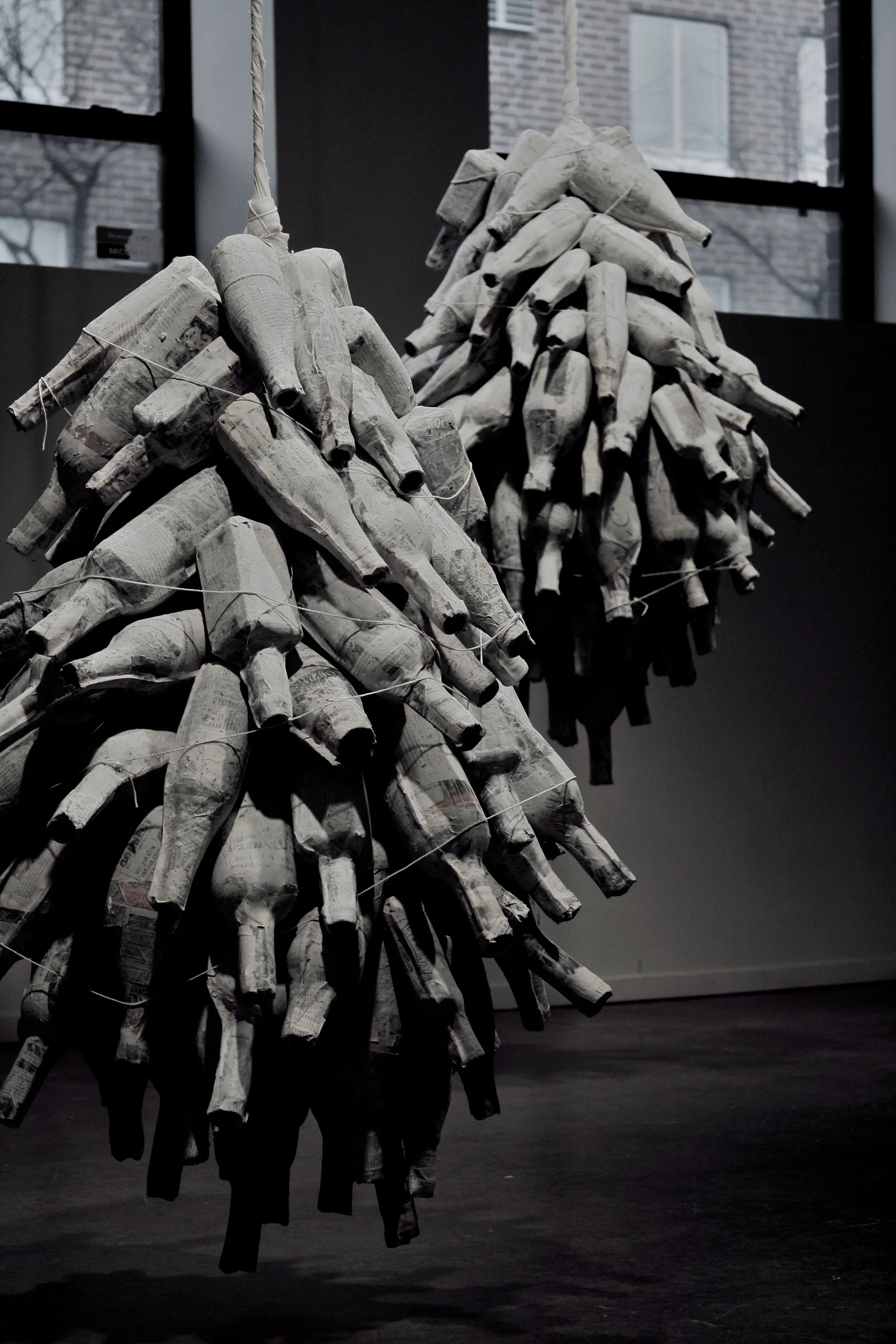 Apart, detail, 11’ x 13’, earthenware, newspaper, paint, paper mache, string, 2008