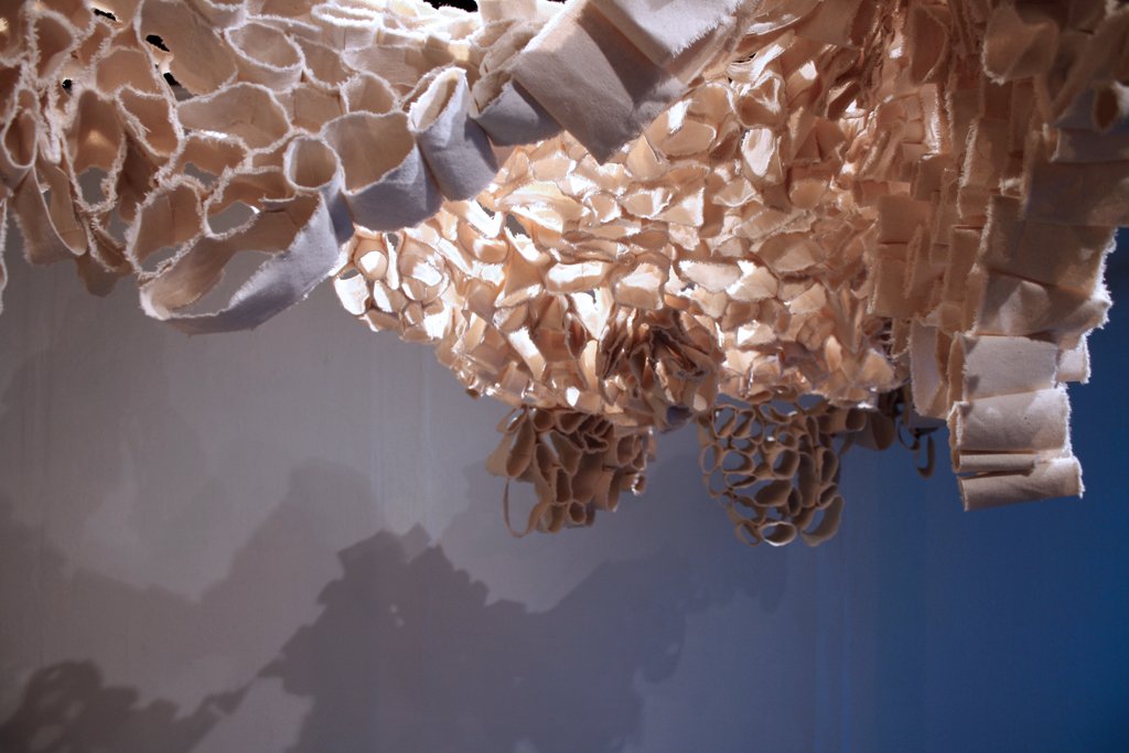 HomeWork, clay, canvas, hot glue, thread, found table, 2012