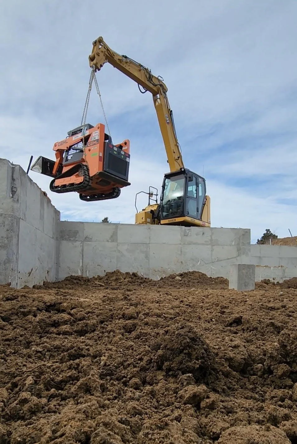 lifting skid steer.jpg