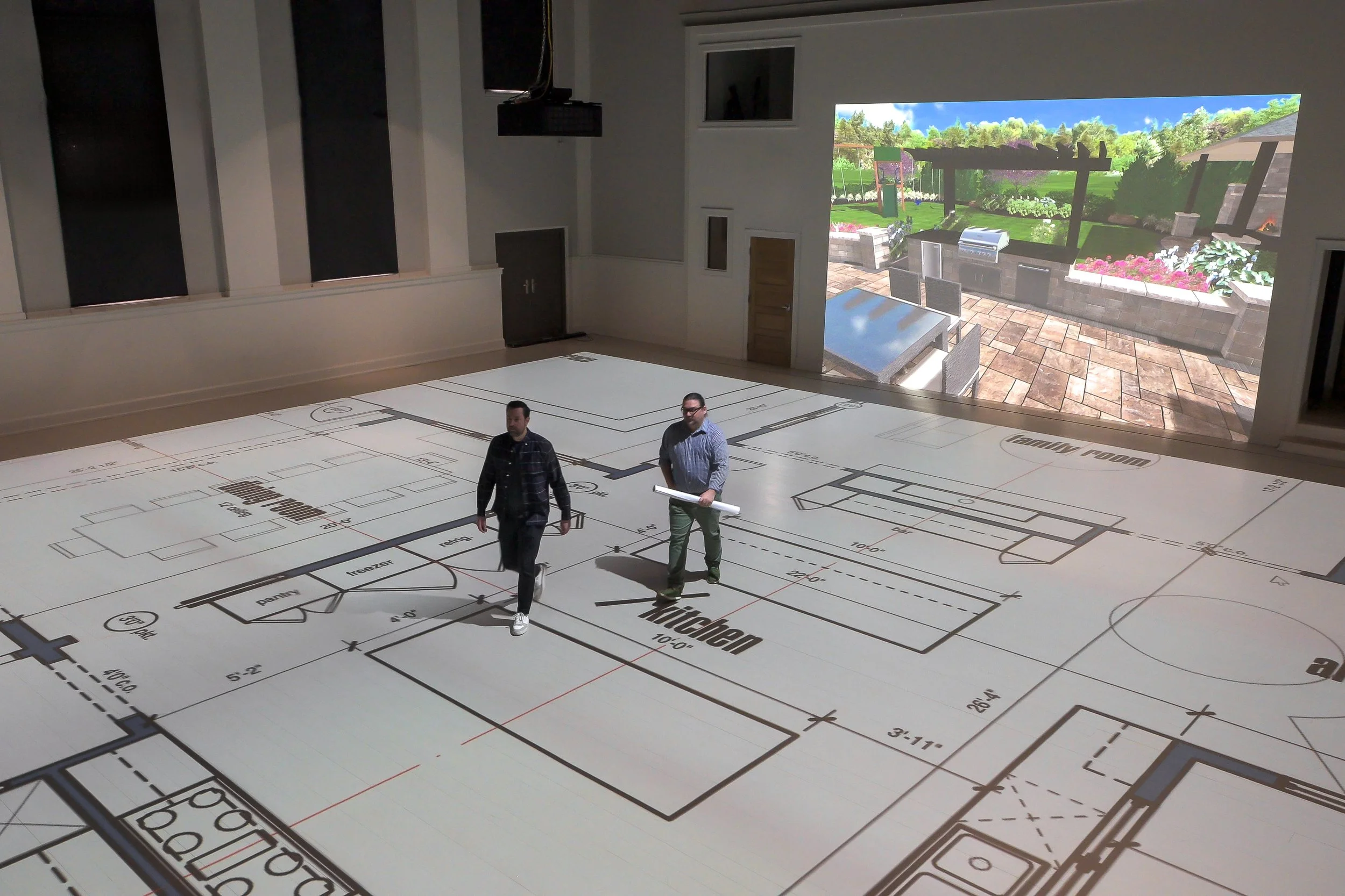 Architect walking plans at full scale