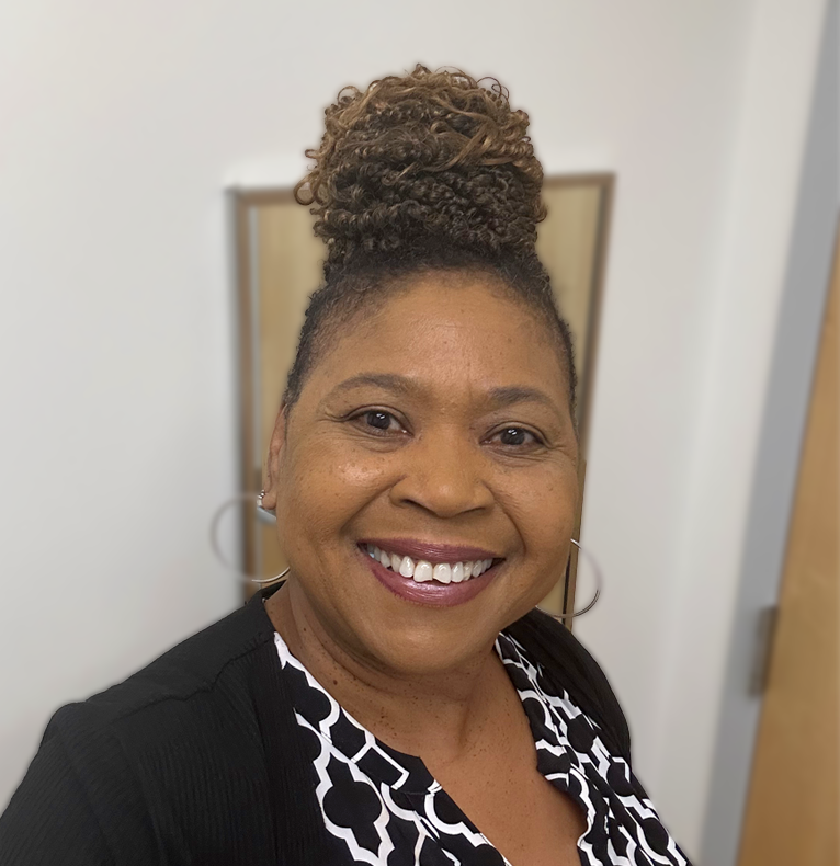 Portrait of team member of The Woman's Opportunity Rehabilitation Center, Theresa Samuel,Administrative Assistant/Case Aide.