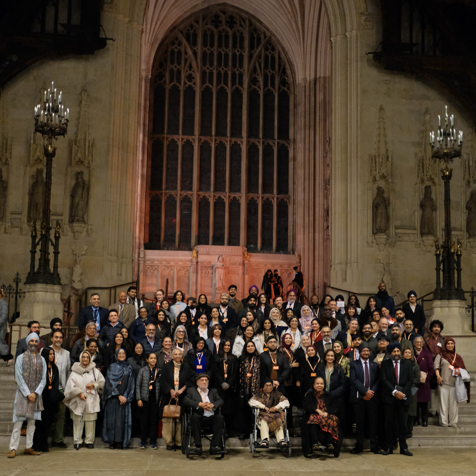A group of people stood at the steps at Houses of Parliament