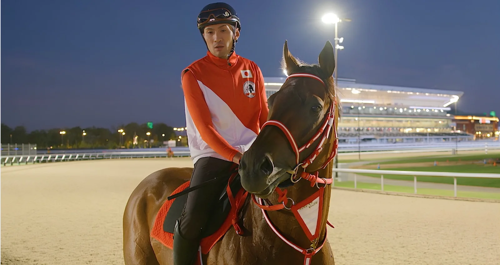 Forever Young stands with his rider at the rebuilt Belmont Park