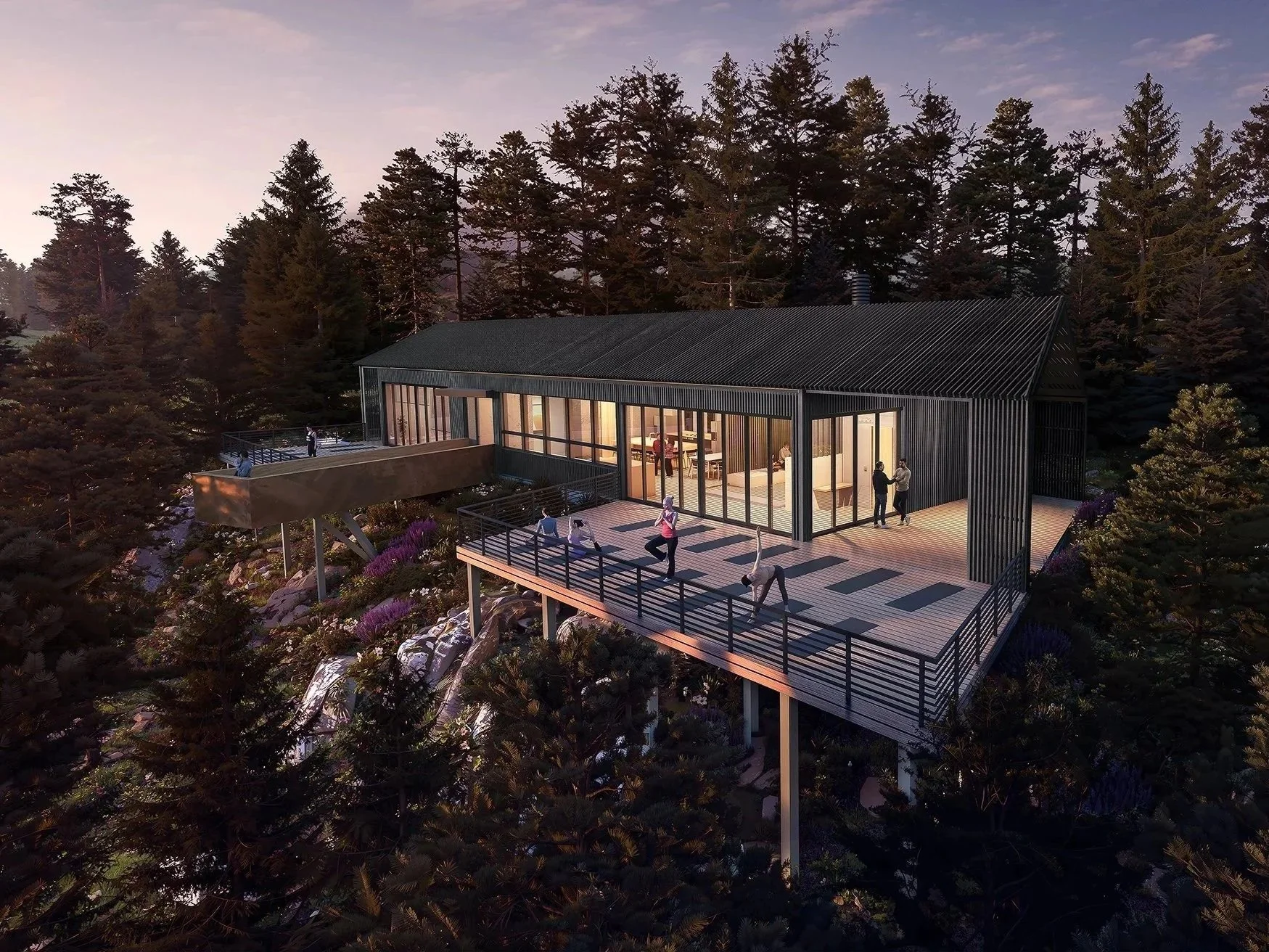 Construction materials lie on a meadow near a building in the forest