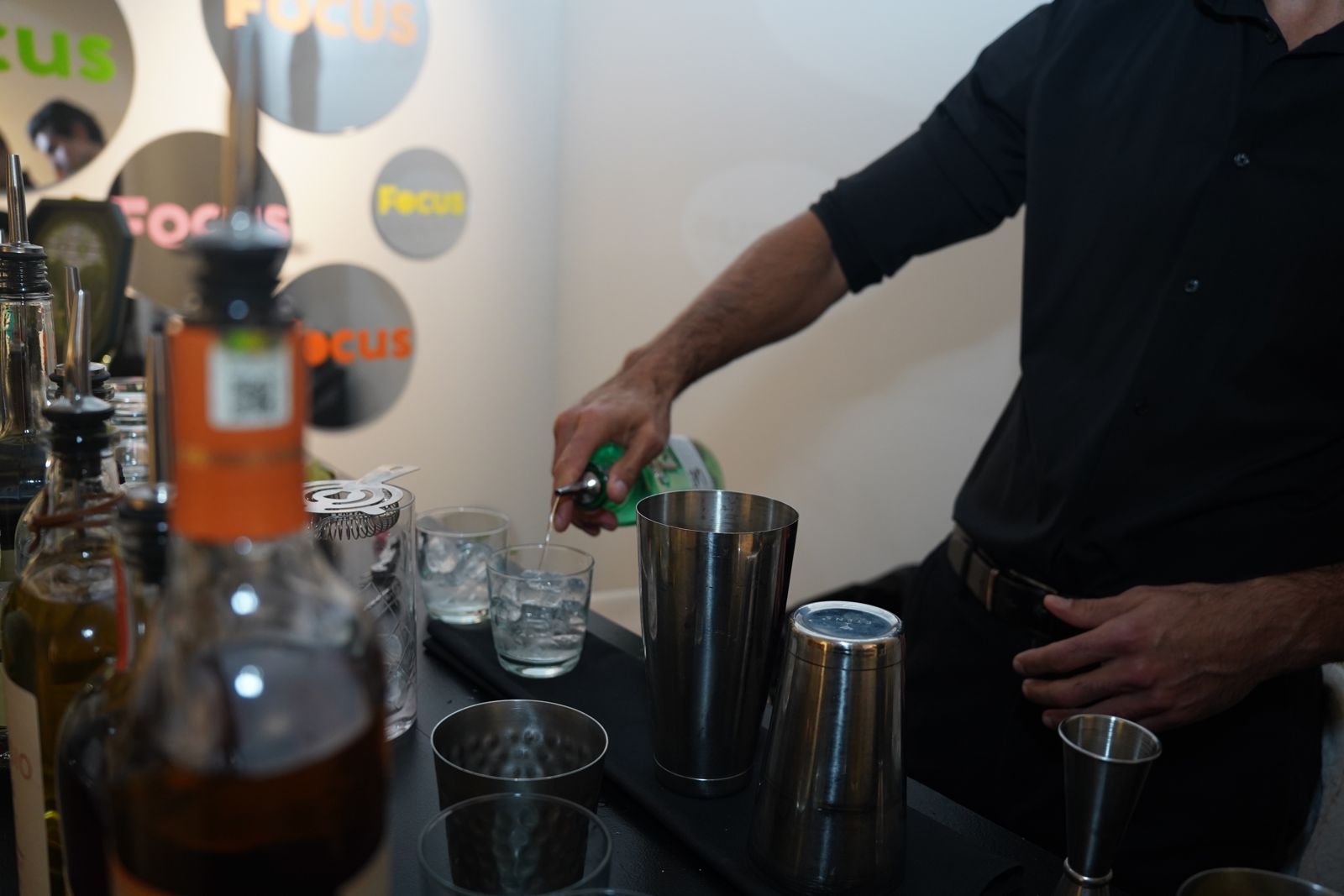 Bartender preparing a guided spirits tasting at a Night Inn event in NYC