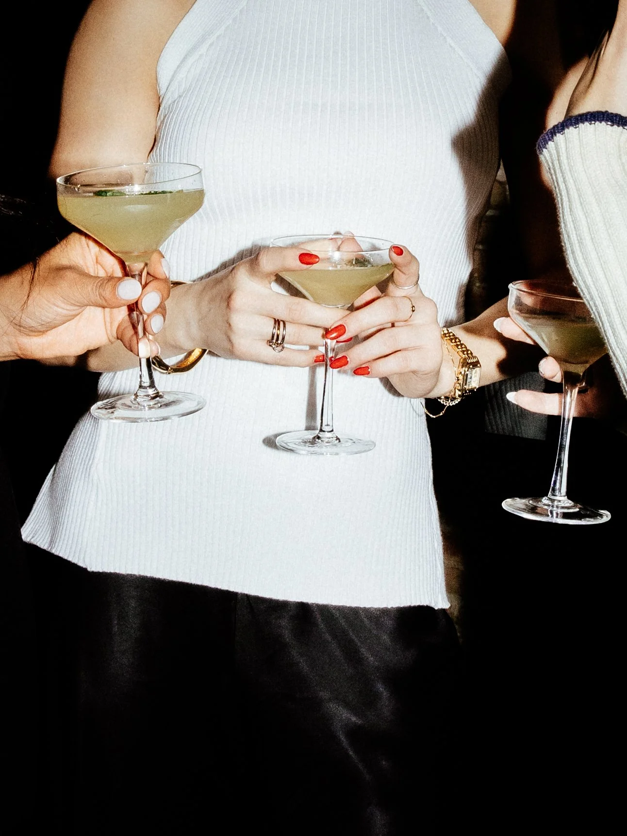 Guests toasting with cocktails at a Night Inn private event in NYC