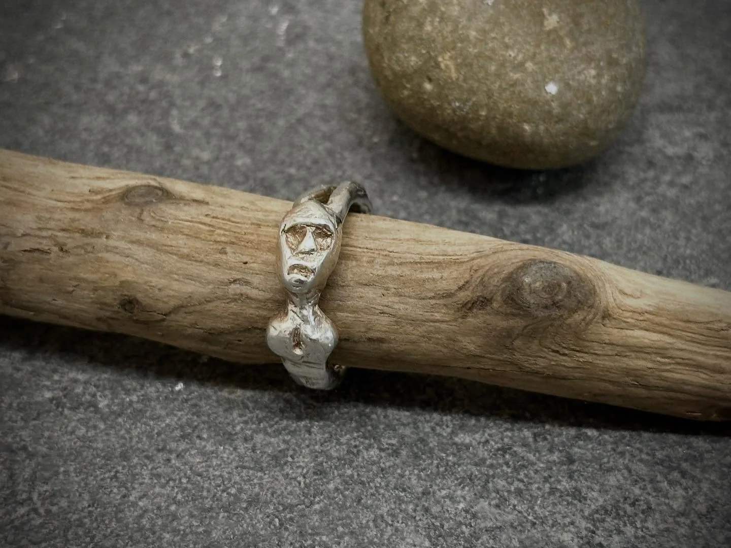 Roos Carr ring in sterling silver. Based on the original artefact this ring has a tiny detachable penis allowing the figure move fluidly between genders.

The Roos Carr figures are a collection of five anthropoid warriors with oval faces set with qua