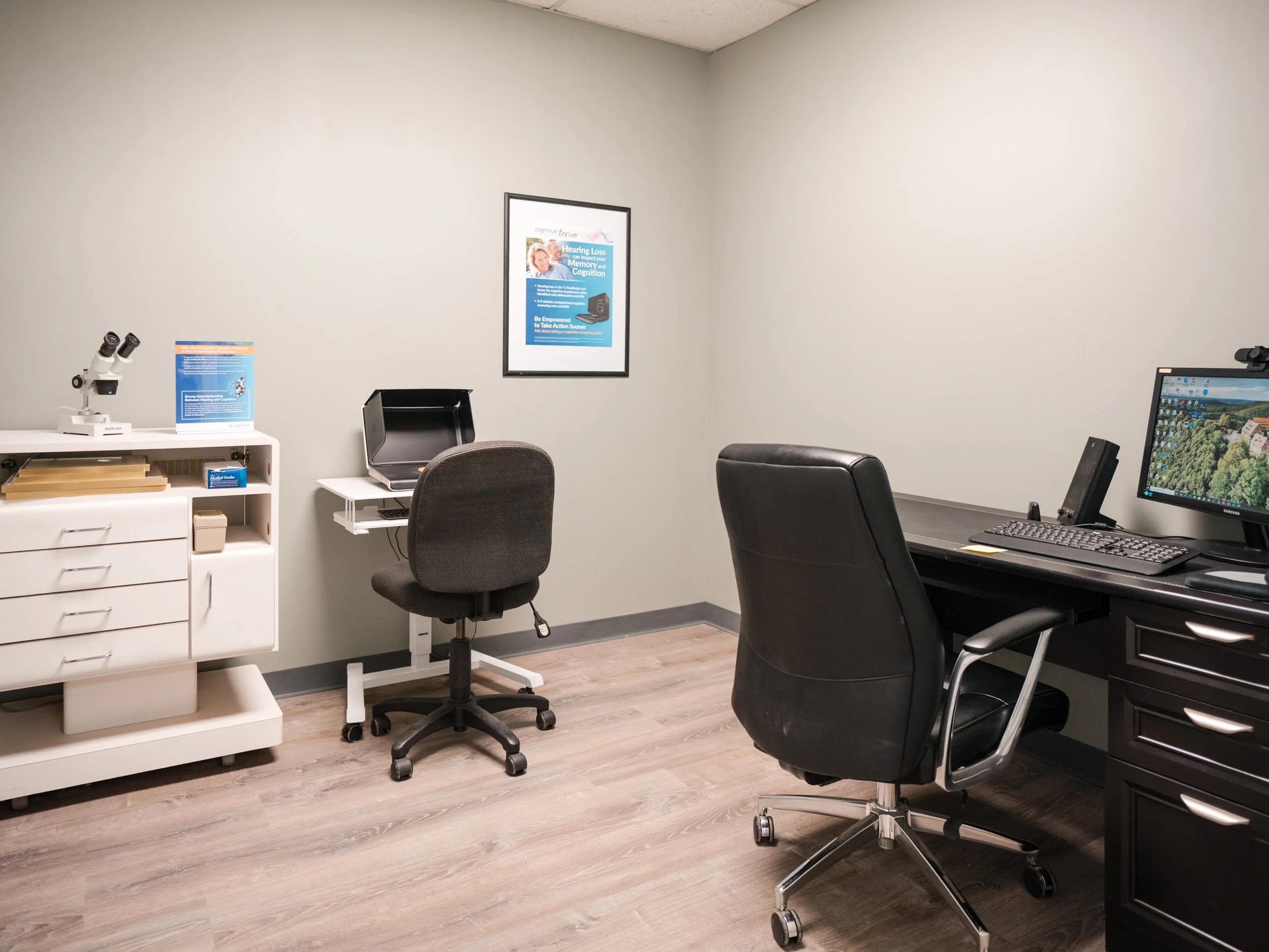 A close-up of a healthcare professional examining a patient's ear with an otoscope.