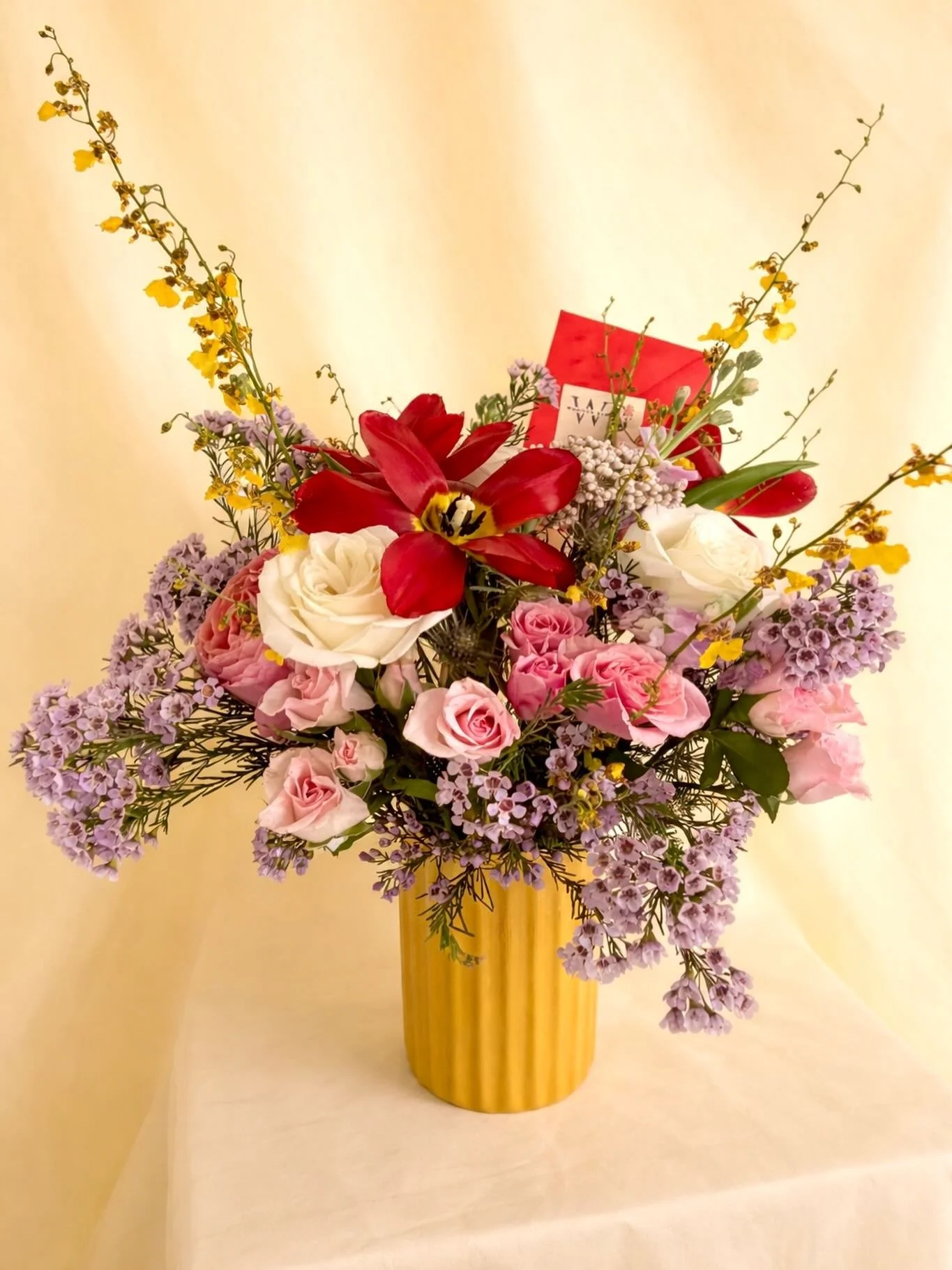 Spring flowers just hit different. 🌸💛🌷
This one feels soft, bright, and full of life, pink roses, red tulips, airy lavender waxflower, and pops of yellow orchids all coming together in the happiest way. Designed on a whim, inspired by the season, 