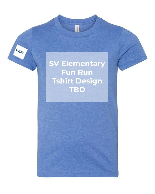 Blue T-shirt with a white logo patch on the sleeve and a text overlay that reads "SV Elementary Fun Run T-shirt Design TBD."