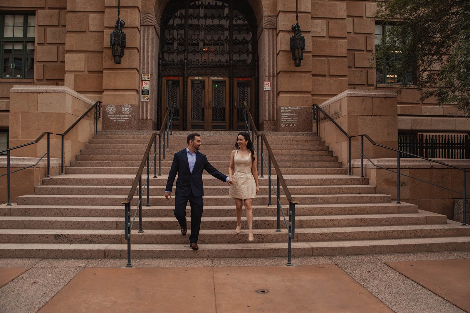Courthouse engagement photos in cloudy weather