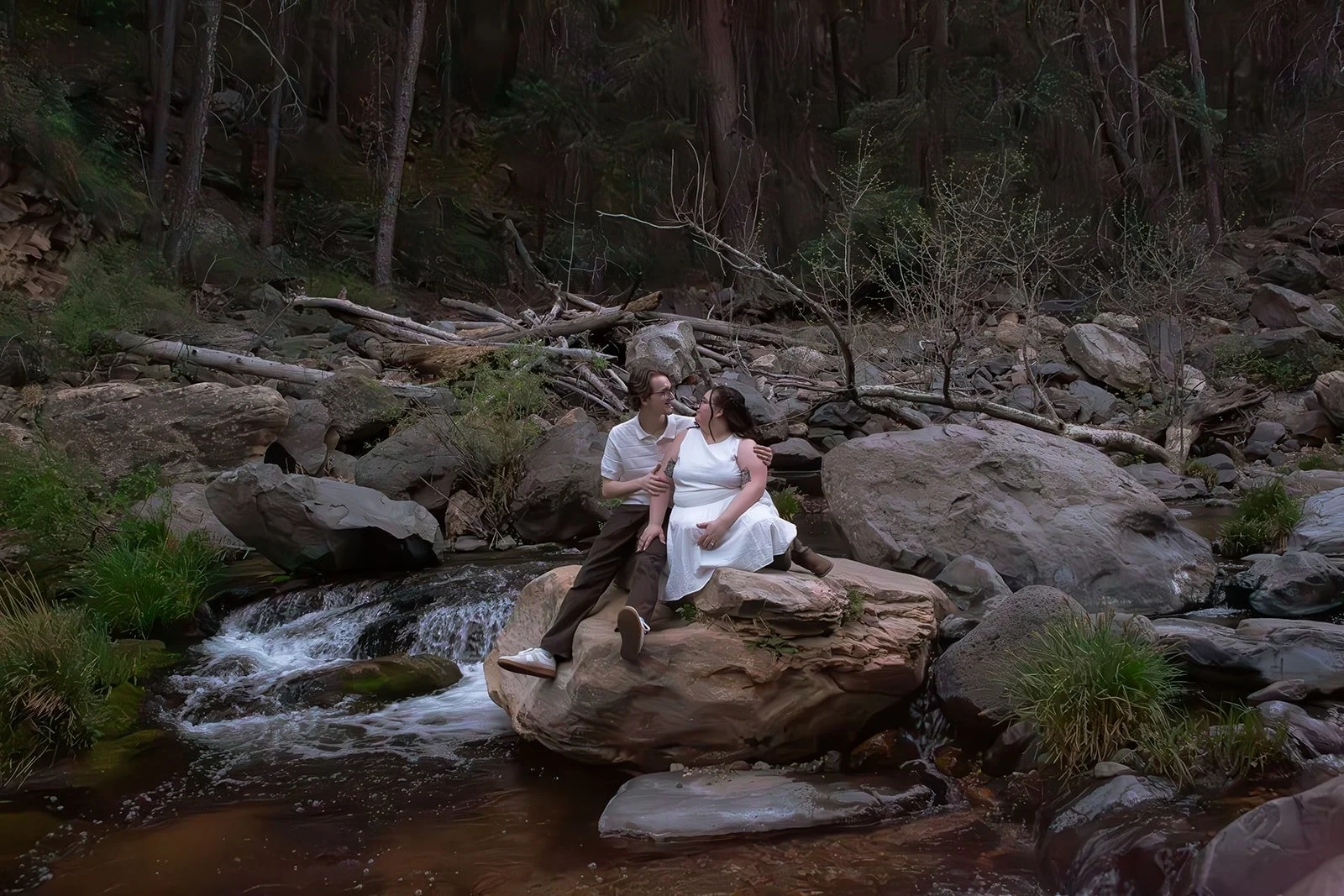 Engagement photos in Sedona, Arizona by a stream