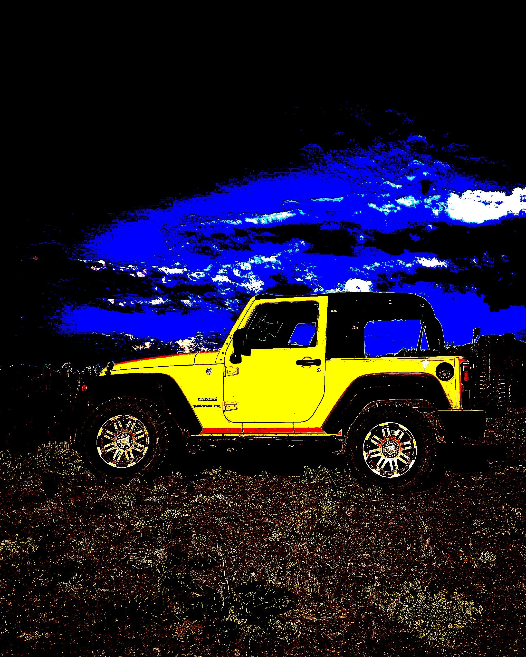 Yellow Jeep at a scenic Sierra Nevada vista showcasing dramatic colors and tones from a creative photo filter