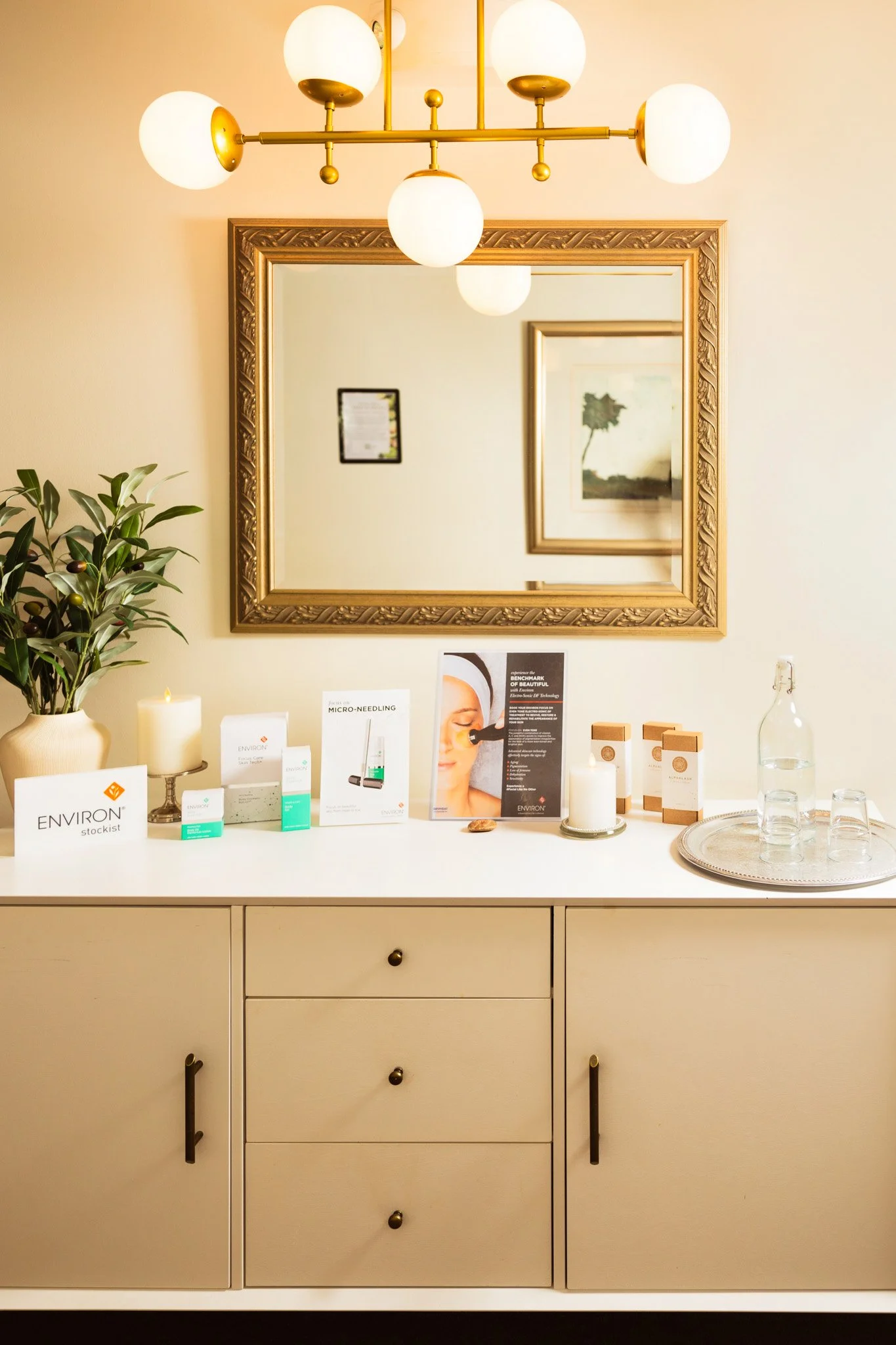 beautiful display of skin care products on a dresser in a wellness clinic
