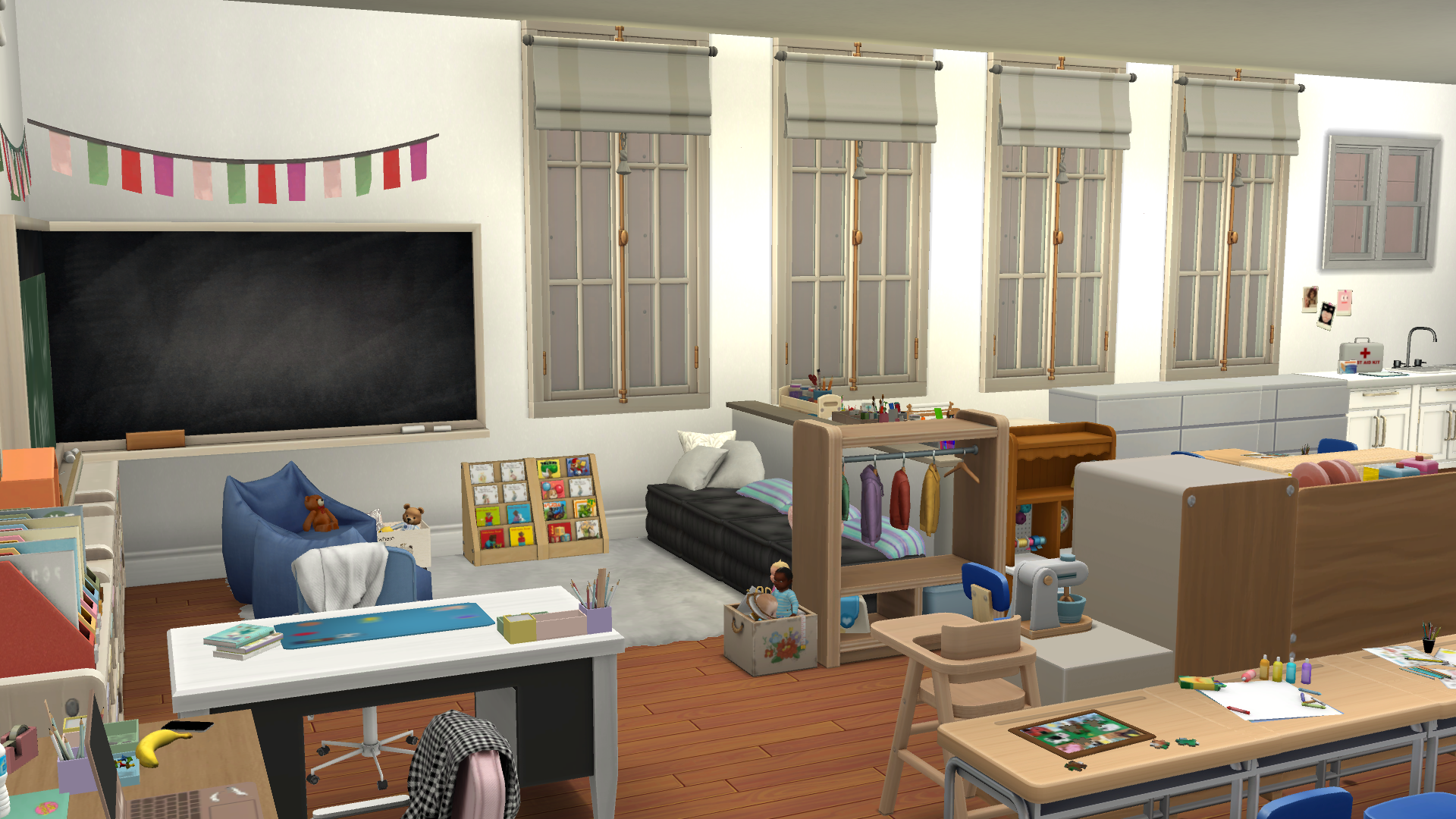 Here you can see the book nook, set with comfy bean bags, pillows, stuffed animals and a book shelf.